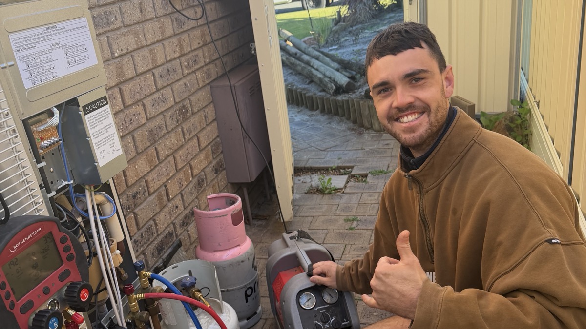 James, owner of Primal Air & Refrigeration, on the tools at a job site